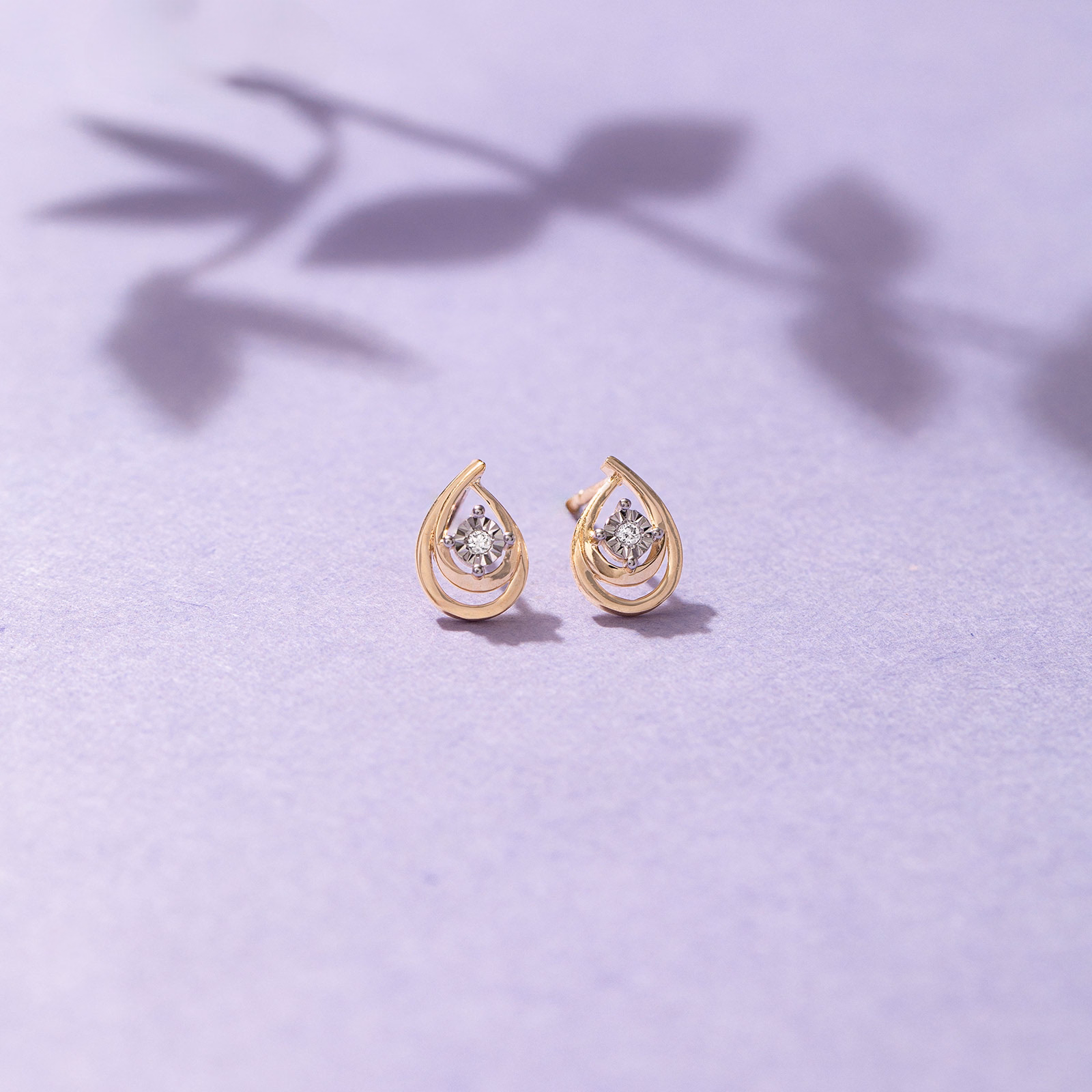 Diamond Earrings 9 Karat Yellow Gold Dual Pear Diamond Stud Earrings
