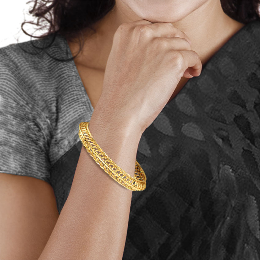 Wave Cut-Out Gold Bangle Wave Cut-Out Gold Bangle