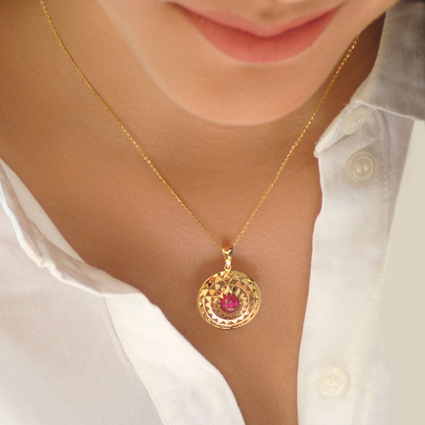 Symmetric Ornate Gemstone Pendant Symmetric Ornate Gemstone Pendant