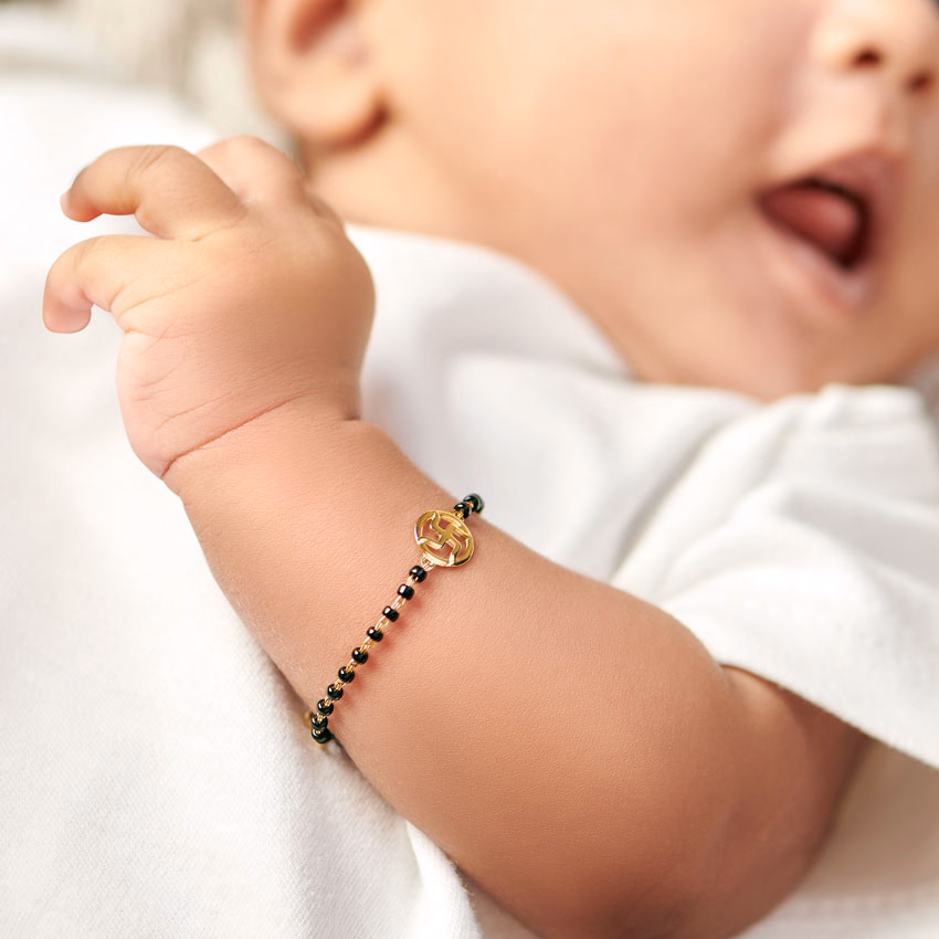 Gold Bracelets 18 Karat Yellow Gold Swastik Baby Nazaria Gold Bracelet