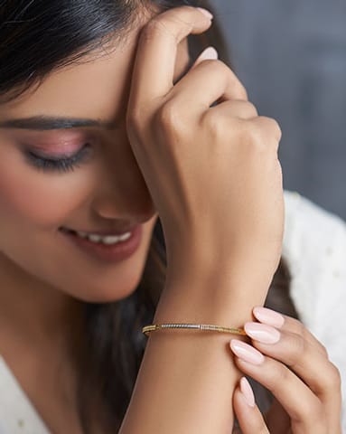 Nithyashree 22KT Gold Bangles Nithyashree 22KT Gold Bangles