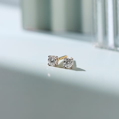 Gleaming Round Solitaire Stud Earrings