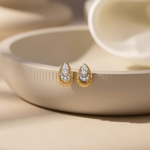 Elegant Pear Solitaire Stud Earrings Elegant Pear Solitaire Stud Earrings