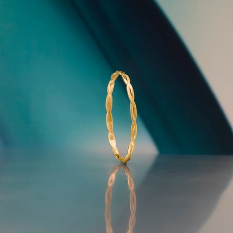 Sleek Twist Gold Bangle