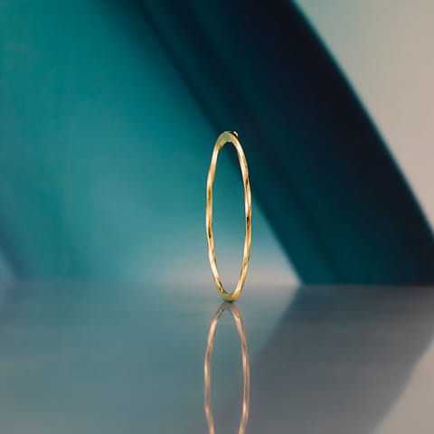 Subtle Twist Gold Bangle
